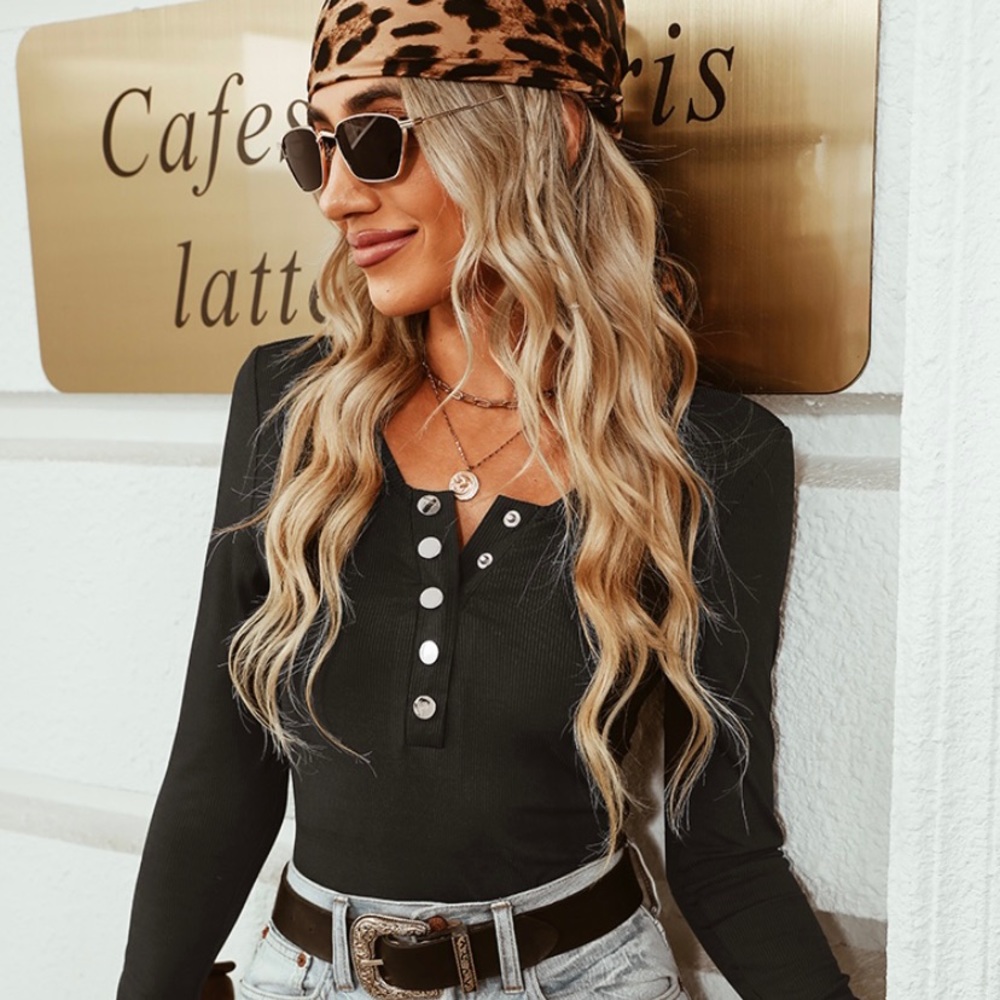 Ribbed black bodysuit from Cupshe with button front.